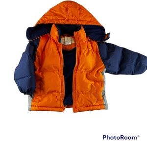 Puffer Toddler coat in orange and navy blue.